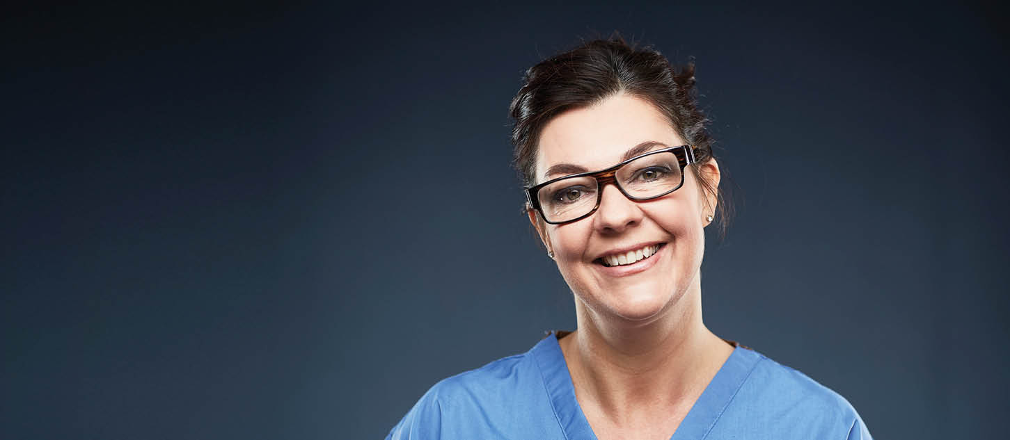 portrait of health care professional looking to camera, smiling